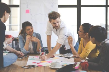 business people working together, meeting and brainstorming in office